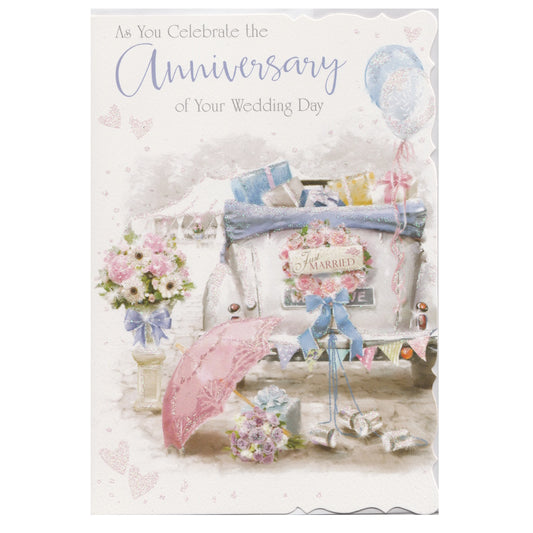 Front of this card features an illustration of a motorcar filled with presents with a just married sign on the back, paired with a message.