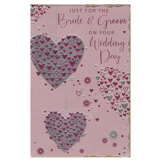 Front of this wedding day card features an illustration of two silver hearts filled with purple hearts on a pink background, paired with a message.