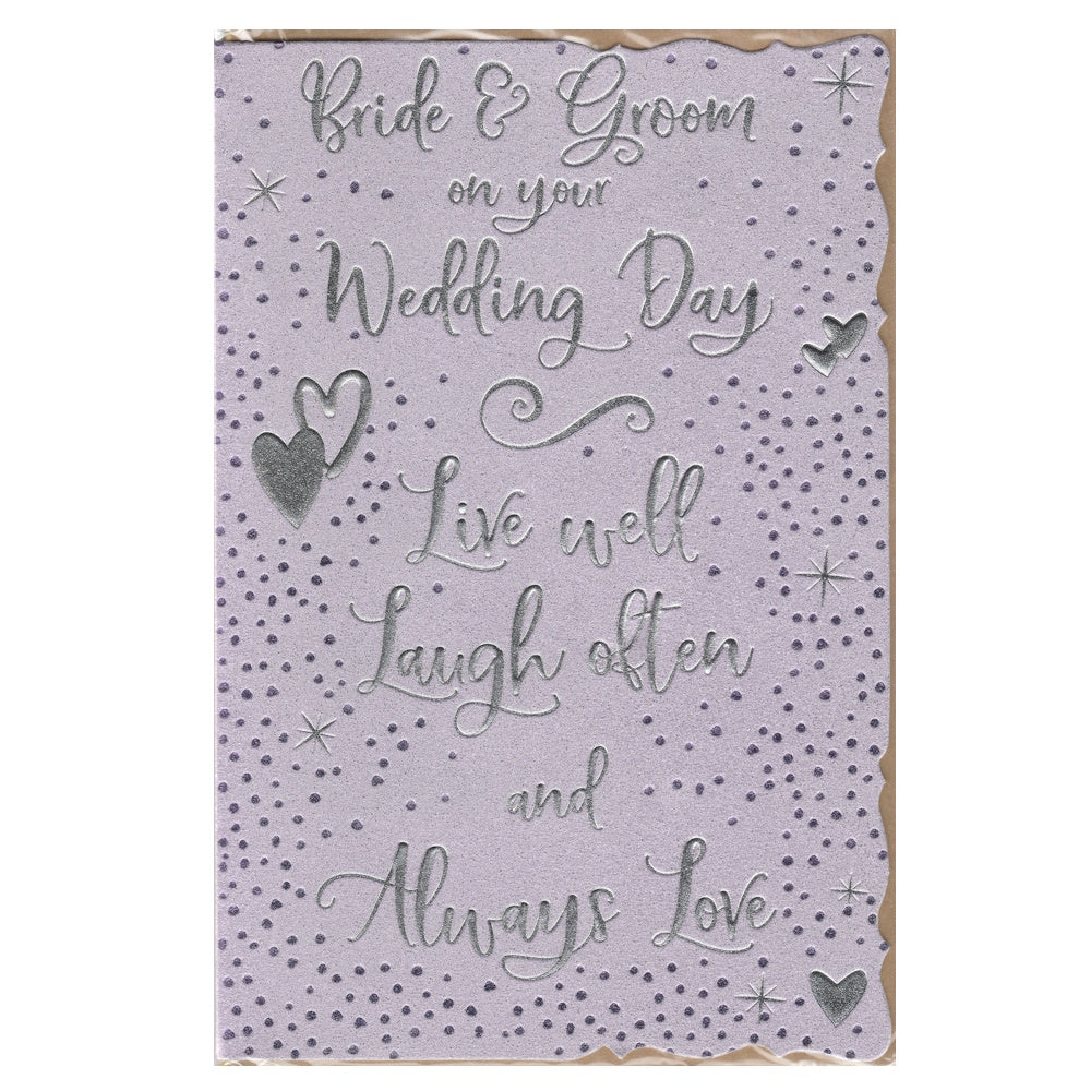This wedding day card has an illustration of two silver hearts surrounded by purple foil dots on a purple background, paired with a message. Silver and purple foil.