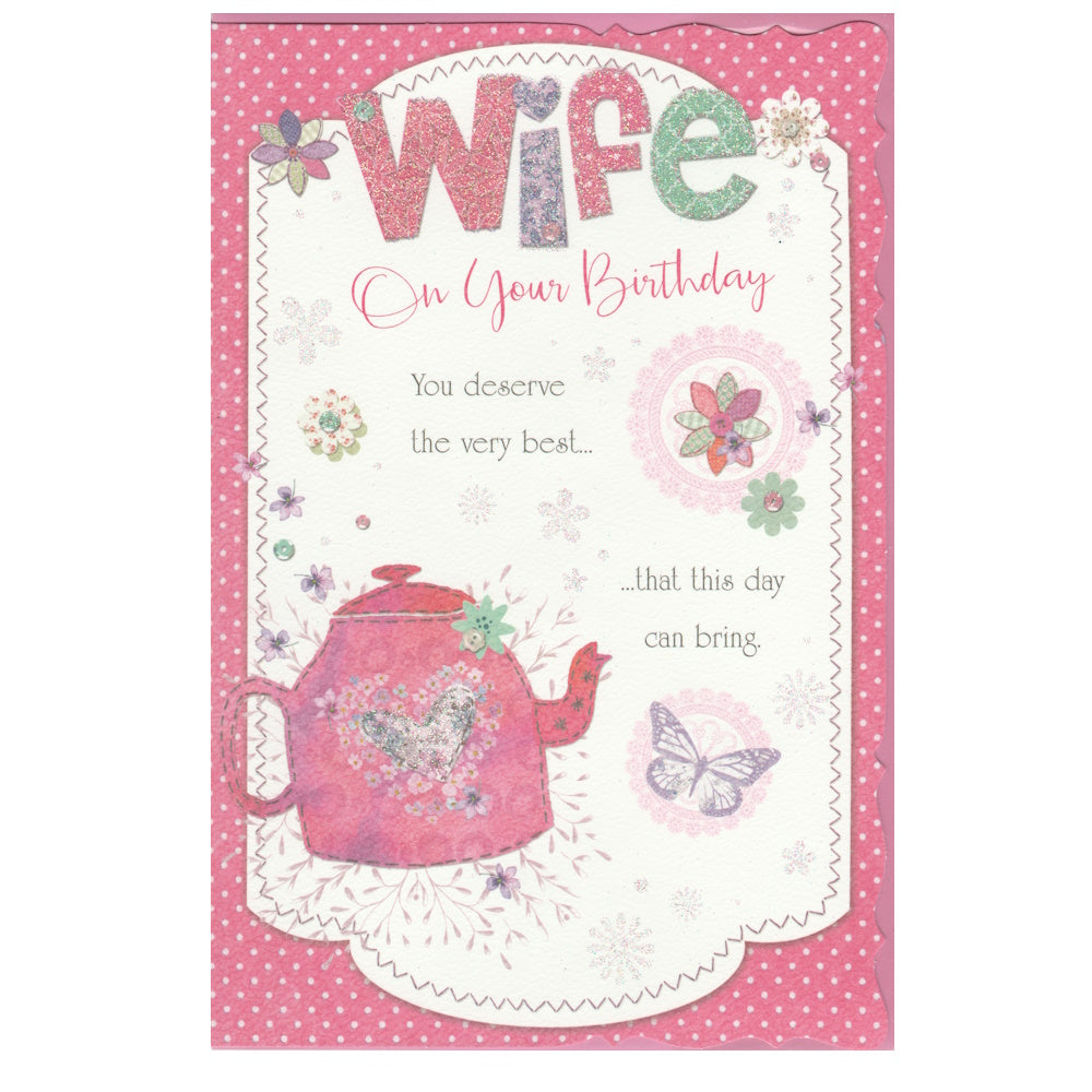 Front of this wife birthday card features illustrations of a pink teapot, butterflies and flowers, paired with a message.