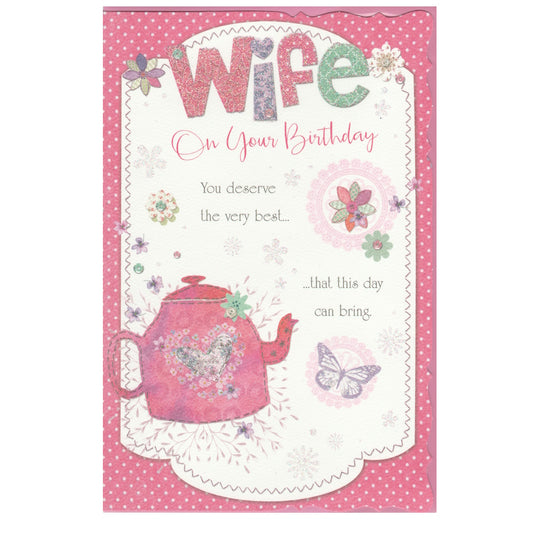 Front of this wife birthday card features illustrations of a pink teapot, butterflies and flowers, paired with a message.