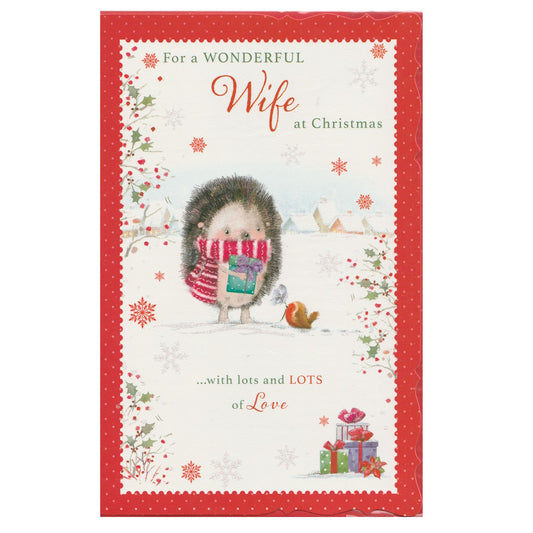 This wife christmas card has an illustration of a hedgehog wearing a striped scarf with a robin in a snowy scene with a red border, paired with a message. Glitter detail.