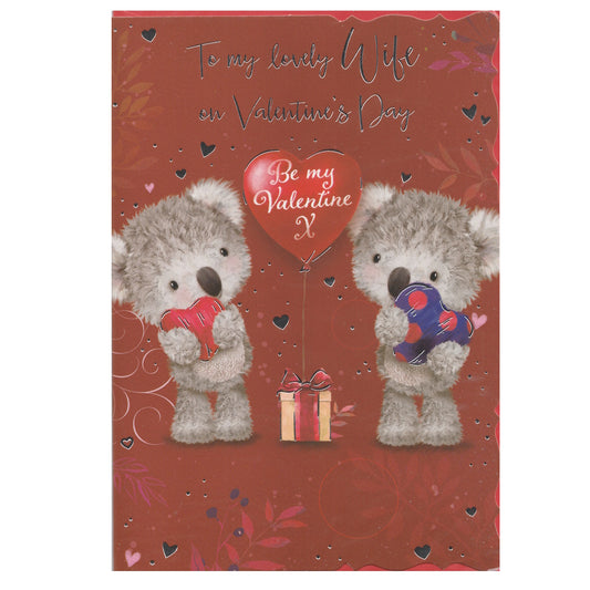 This wife valentine's day card has an illustration of two teddy bears holding love hearts with the text 'To my lovely Wife on Valentine's Day Be my Valentine?' set against a red background with a heart pattern. Silver foil detail.