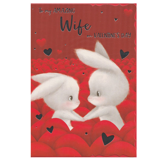 This wife valentine's day card has an illustration of two bunny rabbits surrounded by love hearts with the text 'To my AMAZING Wife on VALENTINE'S DAY'. Silver foil detail.